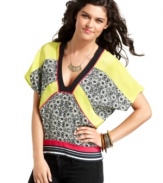 Give your day style a dose of global flavor with a kimono-style top that mixes tribal graphics with bold blocks of color! From Rampage.