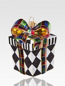 Harlequin diamonds shimmer and shine in this glittering package of mouth-blown, hand-painted glass, all tied up with a bright tartan bow.Glass3.5H X 2.5 squareImported Please note: Due to their handmade nature, ornaments may vary slightly. Harlequin diamonds shimmer and shine in this glittering package of mouth-blown, hand-painted glass, all tied up with a bright tartan bow.Glass3.5H X 2.5 squareImported Please note: Due to their handmade nature, ornaments may vary slightly.
