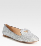 Glitter-coated slipper with metallic leather trim. Glitter fabric upperQuilted leather liningRubber and leather solePadded insoleMade in Italy