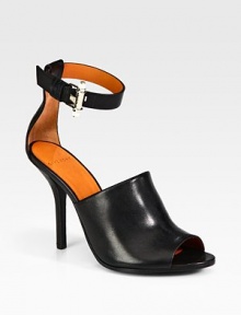 Sleek leather upper topped by a generous heel and an adjustable ankle strap. Self-covered heel, 4 (100mm)Leather upperLeather lining and solePadded insoleMade in ItalyOUR FIT MODEL RECOMMENDS ordering true size. 