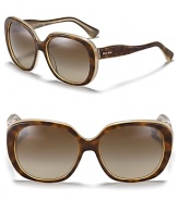 Vintage-inspired sunglasses with curvy temples ensure you stand out in the crowd.