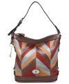 Punch up your everyday ensemble with pretty patchwork, like with this slouchy silhouette by Fossil. Crafted from supple, multi-colored leather and outfitted with shabby-chic hardware, it offers plenty of interior space for all your work or weekend essentials.