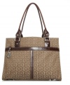 From the tonal logo print to the contrast stitching and logo zip pull, this sleek organizer tote brings a new dimension to practical style. Comes with a removable cosmetic bag!
