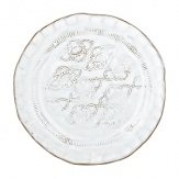 This varied yet coordinated assortment of Vietri plates were each crafted by hand in Tuscany of durable, textural terra cotta for an irresistibly warm appeal. Ornament rolls are used to create each plate's ornate designs.