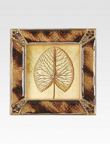 The distinctive colorations of tortoise shell have been cleverly expressed in this frame's striking enamel work, with sparkling Swarovski crystals in complementary hues at each corner.Enamel and crystal18k matte gold finishHandmade, hand-enameled and hand-set2.75 square; holds a 2 square photoImported