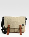 A sophisticated place to store all your daily must-haves in polished waxed linen and leather.Flap with buckle closuresAdjustable shoulder strapExterior front pocketsInterior zip pocketCanvas with leather trim12W X 13½H X 3DImported