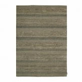 Bring understated modern elegance to your home with this Calvin Klein hand-loomed rug, designed in natural tones with a silky feel and subtle sheen.