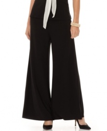 A flare-leg silhouette creates a dramatic look on these elegant matte jersey pants from Onyx. A flare-leg silhouette creates a dramatic look on these elegant matte jersey pants from Onyx.