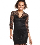 Flaunting a thin overlay of fanciful lace, Ali & Kris' sophisticated sheath dress is built for that special night.