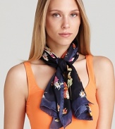 Butterflies, insects and flowers decorate this sheer oblong scarf for a whimsical touch.