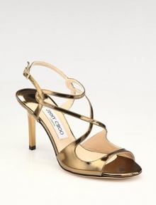 From the Jimmy Choo 24:7 Collection. Gleaming mirrored, metallic leather straps twist and turn.Metallic leather heel, 3¾ (95mm) Open toe Adjustable ankle strap Leather lining and sole Padded insole Made in ItalyOUR FIT MODEL RECOMMENDS ordering true size.. 