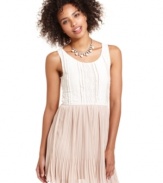 Your weekend playwear: an airy, pleated skirt and contrasting lace top give this Miss Chevious dress a casual vibe! Style it with flats and a cardigan for a brunch date with the girls.