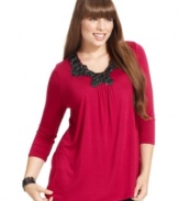 Dress up your casual style with ING's three-quarter-sleeve plus size top, accented by an embellished neckline.