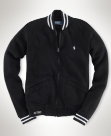 A modern translation of vintage sportswear, this classic fleece track jacket channels athletic heritage with bold stripes and a Polo logo patch. A modern translation of vintage sportswear, this classic fleece track jacket channels athletic heritage with bold stripes and a Polo logo patch.