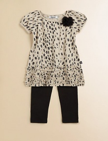 A shimmery animal printed top and soft, stretchy leggings make a glamorous go-to outfit for your little one.CrewneckAnimal print tunic with touches of glitterShort sleevesTulle rose appliquéTiers of ruffles trim the hemSmall logo detail at sideLeggings have elastic waistbandTop: cottonLeggings: cotton/spandexMachine washImported A shimmery animal printed top and soft, stretchy leggings make a glamorous go-to outfit for your little one.CrewneckAnimal print tunic with touches of glitterShort sleevesTulle rose appliquéTiers of ruffles trim the hemSmall logo detail at sideLeggings have elastic waistbandTop: cottonLeggings: cotton/spandexMachine washImported