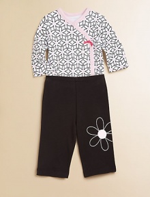 Bold, beautiful daisies adorn the bodysuit and pants of this plush cotton two-piece set with snaps and and elastic waistband. Bodysuit V-neckLong sleevesFront snapsBottom snaps Pants Elastic waistbandCuffed hemCottonMachine washImported Please note: Number of buttons/snaps may vary depending on size ordered. 