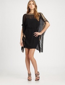 Airy chiffon, in a split-shoulder style trimmed with intricately embroidered sequins.BoatneckShort sleeves with split shouldersSequined edgingSelf tie at waistFully linedAbout 19½ from natural waistPolyesterSpot cleanImportedModel shown is 5'10 (177cm) wearing US size 4. Airy chiffon, in a split-shoulder style trimmed with intricately embroidered sequins.BoatneckShort sleeves with split shouldersSequined edgingSelf tie at waistFully linedAbout 19½ from natural waistPolyesterSpot cleanImportedModel shown is 5'10 (177cm) wearing US size 4.