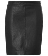 Perfectly cut in trend favorite leather, Neil Barretts tailored skirt is a luxe essential destined to be your signature staple - Hidden side zip, form-fitting - Pair with chunky knits and flats