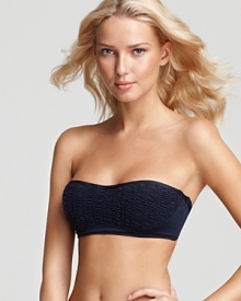 Interchangeable swimwear is a must for the seasoned sunbather, and this solid smocked bandeau top from Juicy Couture is a playful way to be a mix and match master.