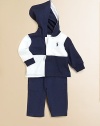 The epitome of sporty style, a timeless set includes a quartered cotton mesh rugby hoodie with an athletic pant in supremely soft cotton. Hoodie Attached hoodLong sleeves with ribbed cuffsFront buttonsEven-vented hem Pants Sewn flyElasticized waistband with bow tieVertical on-seam hand pocketsCottonMachine washImported