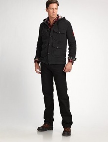 In black-washed denim with a classic fit, a modern jean for the modern man.Zip flyButton closureBelt loopsFive-pocket styleComfortable fit through hip and thighInseam, about 34CottonMachine washImported