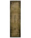A long runner that is ideal for hallways and entryways. Beautiful and modest, this rug features a faded backdrop of earth hues gradually ascending from dark to light, creating a subtle yet graceful look. Elegant, curvilinear vines are patterned on the rug, completing its stunning style. Easy-care polypropylene ensures durability.