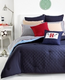 This Midnight Hilfiger Prep sham features a patriotic blue landscape with red accents. The unique combination of allover diamond quilting and signature ribbon elements reflect classic Tommy Hilfiger style. This Midnight Hilfiger Prep sham features a patriotic blue landscape with red accents. The unique combination of allover diamond quilting and signature ribbon elements reflect classic Tommy Hilfiger style.