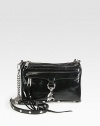 A versatile design in patent leather, accented with sleek hardware and a versatile detachable strap.Detachable chain and leather shoulder strap, 22 dropMagnetic top closureProtective metal feetOne outside zip pocket with hookOne inside zip pocketTwo inside open pocketsCotton lining9W X 6H X 1DImported