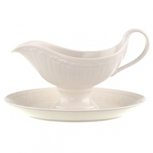 This collection of classic white, patterned dinnerware and serveware is remarkable for its ability to coordinate with a variety of table linen and flatware patterns. This collection of classic white, patterned dinnerware and serveware is remarkable for its ability to coordinate with a variety of table linen and flatware patterns.