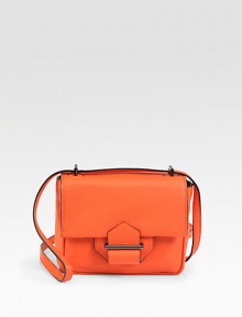 Soft pebble-grain deer skin leather crafted in a demure flap-front satchel.Adjustable shoulder strap, 13½-25 dropMagnetic snap flap closureOne outside open pocketOne inside zip pocketCotton lining7W X 5½H X 2DImported