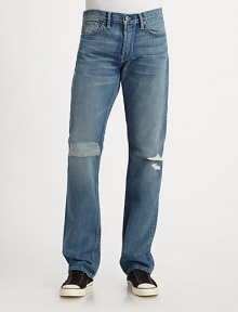 Slim fit five-pocket design cut from fine selvage denim that is meticulously woven on narrow, shuttle looms for a premium texture.Mid-width waistband with belt loops Front zipper and button fly Five-pocket style Creased and whiskered details at legs Faded detail at back waistband Inseam, about 32 Cotton; hand wash or machine wash Made in USA