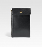 A stylish travel companion with all of the necessary compartments to store your boarding pass, passport, credit cards, money and other important documents, crafted in soft Italian calfskin leather.Zip, snap button closureWrist strapOne bill compartmentSix card slots6W x 8HLeatherMade in Italy