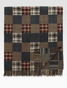 Preppy checks and tartan accents elevate this sophisticated throw crafted from fine Italian wool.Fringed ends55 x 67WoolDry cleanMade in Italy Preppy checks and tartan accents elevate this sophisticated throw crafted from fine Italian wool.Fringed ends55 x 67WoolDry cleanMade in Italy