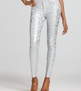 A metallic floral print shimmers on these 7 For All Mankind skinny jeans.