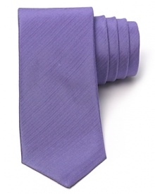 Rock this skinny purple tie whenever you need a modern downtown accent.
