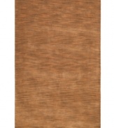 Varying shades of tan create a lush texture that's sure to make waves in your home. Crafted by hand-tufting fibers of soft, rich wool, this area rug from St. Croix is rustic and refined, boasting a tonal flow that adds subtle dimension to your decor.