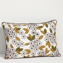 Fashioned in a fun floral print, complete your garden bedroom setting with this lovely decorative pillow. Fashioned in a fun floral print, complete your garden bedroom setting with this lovely decorative pillow.