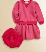 Soft brushed fleece dress has the look of a sweatshirt-and-skirt, with coordinating jersey bloomers.Long sleeve pullover Rib knit trim at crewneck, cuffs and waist Patch pockets Bloomers with elasticized waist and leg openings 50% cotton/50% modal Machine wash Made in USA