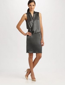 Washed silk charmeuse drapes elegantly around this body in this billowing crossover design.SleevelessCrossover frontBlouson bodiceElastic back bandAbout 19 from natural waistSilkDry cleanImported
