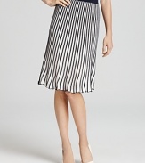 Pleats made the runway a sensation and this BCBGMAXAZRIA skirt explores the trend with a two-tone rendering and easy pull-on style. Add a simple black sweater and pointy pumps to punctuate the look perfectly.