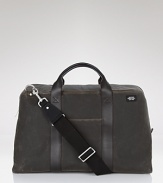 A modern take on the duffle, this Jack Spade duffle bag in rugged waxed cotton exudes getaway cool.