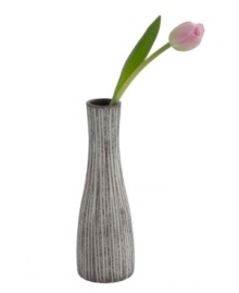 Vertical lines, muted colors and a sleek silhouette in simple ceramic give the Design Ideas Fiji vase a sense of understated cool. Vertical lines, muted colors and a sleek silhouette in simple ceramic give the Design Ideas Fiji vase a sense of understated cool.