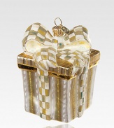 A glittering, golden package with a Parchment Check bow is crafted of mouth-blown, hand-painted glass, adding some sparkle to your tree.Glass3.5H X 2.5 squareImported Please note: Due to their handmade nature, ornaments may vary slightly. 
