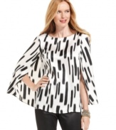 The silhouette of the season -- the cape -- makes for a truly special blouse from Nine West. Perfect for partnering with slim silhouettes like a pencil skirt or skinny pants.