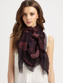 Varying prints in a block design with fringe accents. 90% modal/10% cashmereAbout 55 X 55Dry cleanMade in Italy