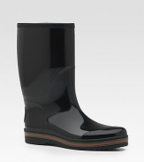 Rubber rain boot with signature trim and interlocking G on back. Rubber sole. Made in Italy. Please note: For best fit please size down one full size.