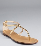 Glimmering gold-tone leather makes a glamourous statement on Boutique 9's Paulyne sandals.