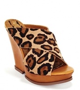 Bold, crisscrossing leopard print straps are a striking new neutral. Pair these platforms with wide-leg denim for a chic '70s flashback. By Sam Edelman.