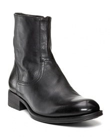 Leather short boots with side zip and rounded toe. Leather stacked heel on treaded, rubber sole. Leather short boots with side zip and rounded toe. Leather stacked heel on treaded, rubber sole.