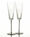 Enjoy a crisp toast with this delightfully elegant pair of champagne flutes. In clear crystal, this set features the finely cut ribbon motif of the Belle Boulevard collection.